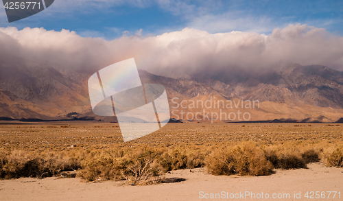 Image of Rainbow Storm Brewing Rain Falling Sierra Nevada Range