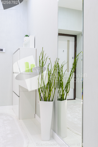 Image of modern white apartment hallway