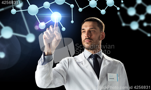 Image of doctor or scientist in white coat with molecules