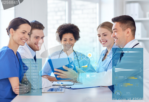 Image of group of happy doctors meeting at hospital office