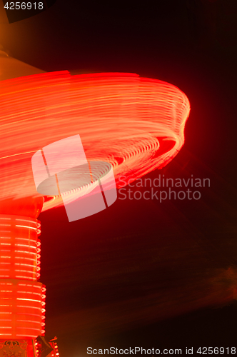 Image of Local State Fair Carnival Ride Long Exposure Red Streaks