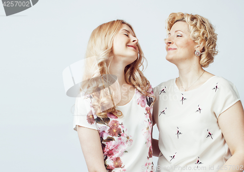 Image of mother with daughter together posing happy smiling isolated on white background with copyspace, lifestyle people concept 