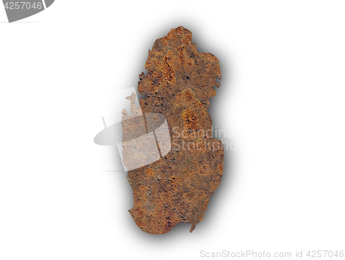 Image of Map of Qatar on rusty metal