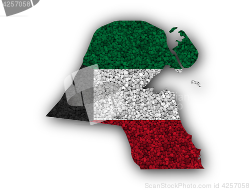 Image of Map and flag of Kuwait on poppy seeds