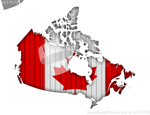 Image of Map and flag of Canada on corrugated iron