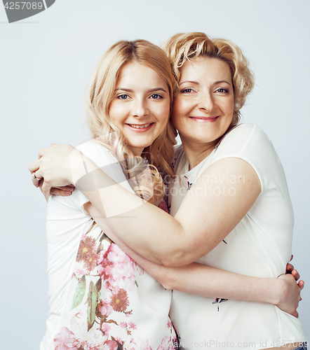 Image of mother with daughter together posing happy smiling isolated on white background with copyspace, lifestyle people concept 