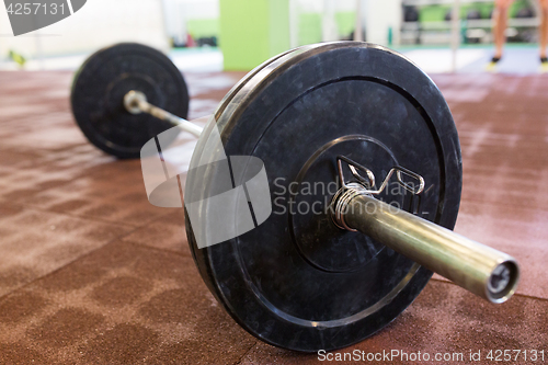 Image of barbell on floor in gym