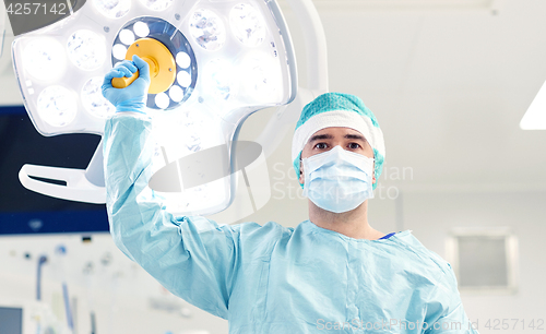 Image of surgeon in operating room at hospital