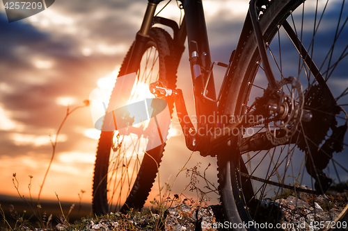 Image of Mountain bike against sunset