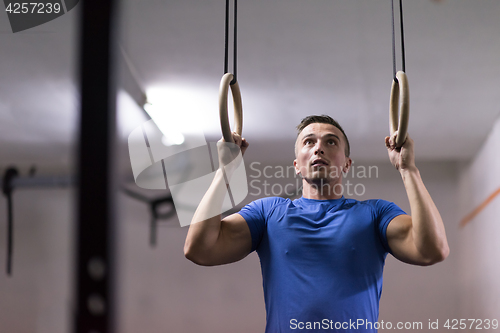 Image of man doing dipping exercise