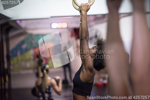 Image of black woman doing dipping exercise