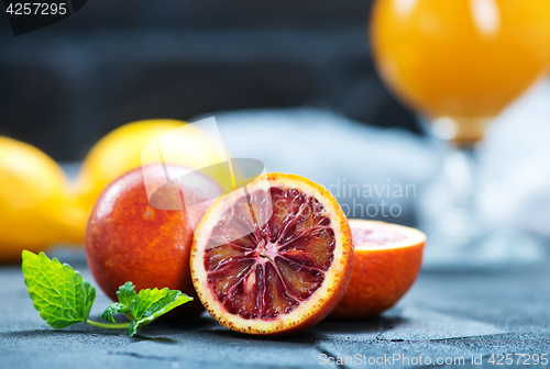 Image of orange juice and orange