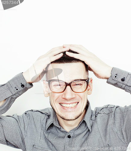 Image of young handsome well-groomed guy posing emotional on white background, lifestyle people concept 