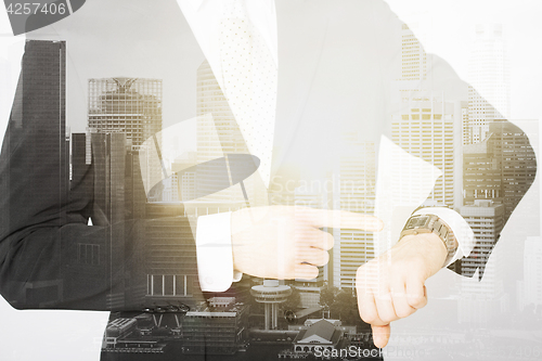 Image of close up of businessman with wristwatch