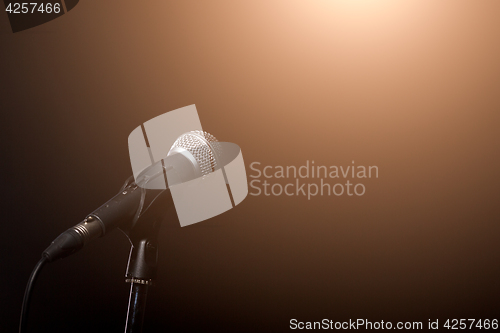 Image of Microphone in light of spotlight