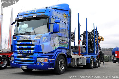 Image of Customized Blue Scania Logging Truck on Display