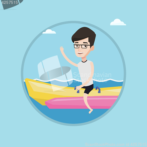 Image of Tourists riding a banana boat vector illustration.