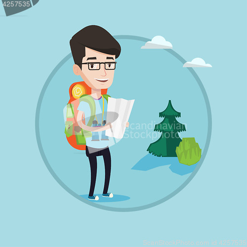 Image of Traveler with backpack looking at map.