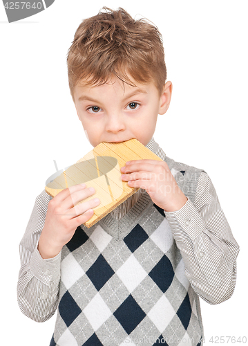 Image of Little boy eating waffle