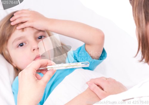 Image of Sick little girl in bed