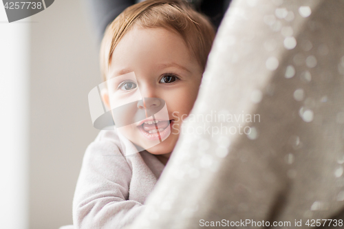 Image of happy smiling little baby girl with mother