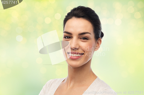 Image of happy smiling young woman with braces