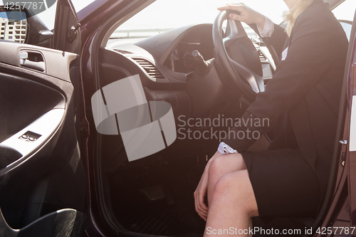 Image of Woman in a car