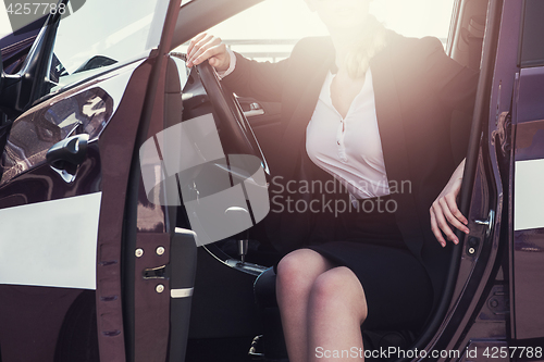 Image of Woman in a car