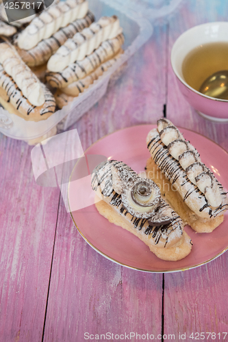 Image of cakes on color background