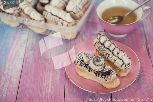 Image of cakes on color background