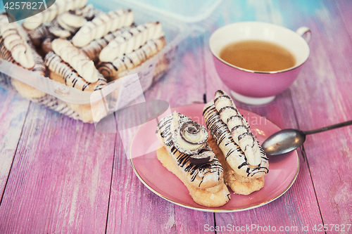 Image of cakes on color background