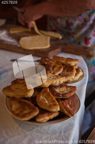 Image of Grandmother bakes pies