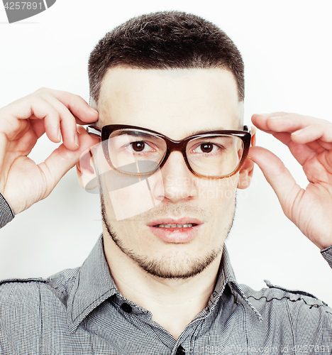 Image of young handsome well-groomed guy posing emotional on white background, lifestyle people concept 