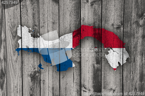 Image of Map and flag of Panama on weathered wood