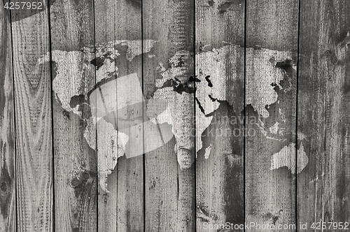 Image of Map of the world on weathered wood