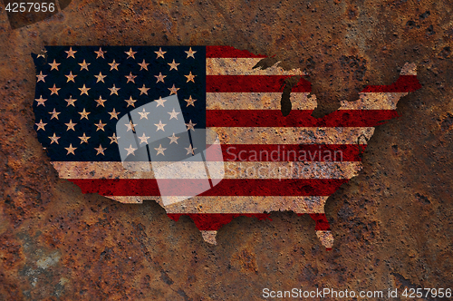Image of Map and flag of the USA on rusty metal
