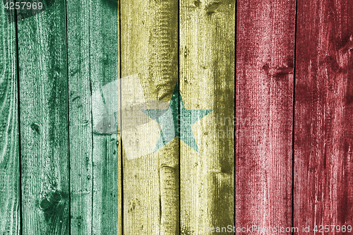 Image of Flag of Senegal on weathered wood