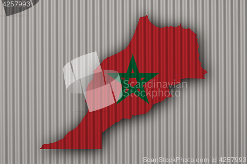 Image of Map and flag of Morocco on corrugated iron