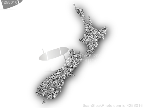 Image of Map of New Zealand on poppy seeds,