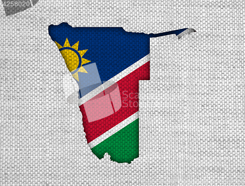Image of Map and flag of Namibia on old linen