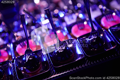 Image of Beautifully decorated catering banquet table with different food snacks.