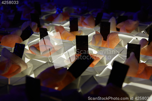 Image of Beautifully decorated catering banquet table with different food snacks.