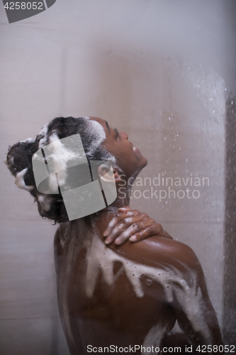 Image of African American woman in the shower