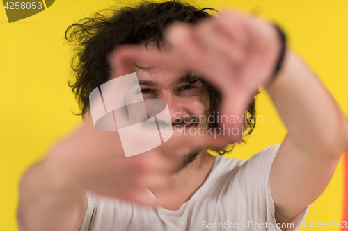 Image of young man with funny hair over color background