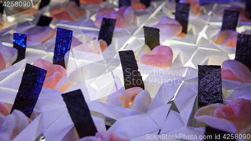 Image of Beautifully decorated catering banquet table with different food snacks.