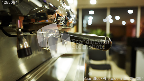 Image of Retro coffee machine holder detail. Shallow focus