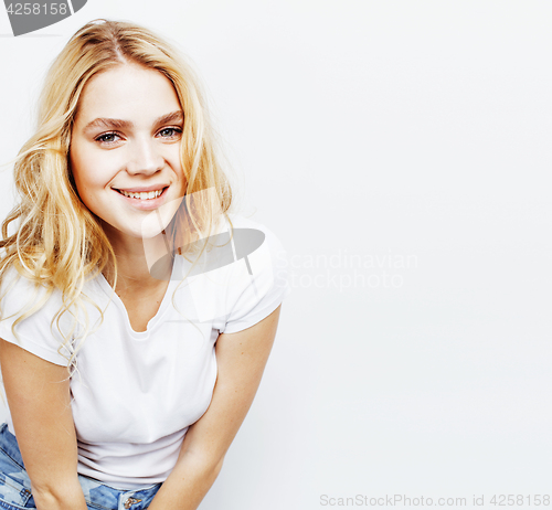 Image of young pretty blond teenage girl emotional posing, happy smiling isolated on white background, lifestyle people concept