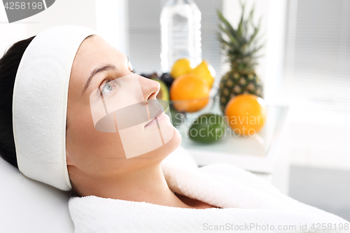 Image of Treatment with fruit acids, a woman in the beauty salon.