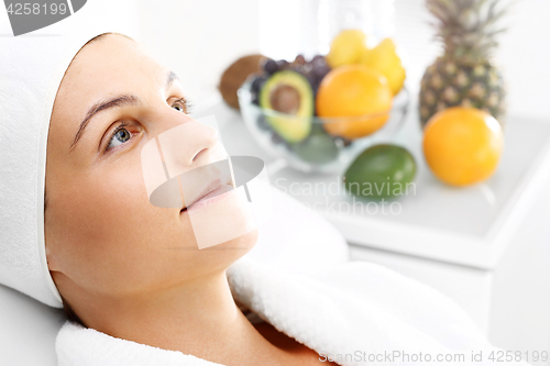 Image of Treatment with fruit acids, a woman in the beauty salon.