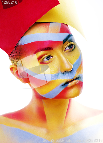 Image of woman with creative geometry make up, red, yellow, blue closeup 